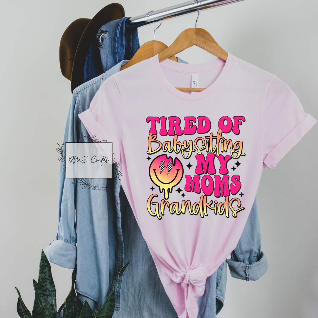 Tired Of Babysitting My Moms Grandkids T-Shirt